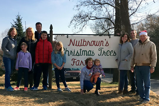 Full family at sign.