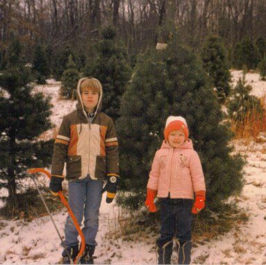 Little Tom and Diane with their tree.